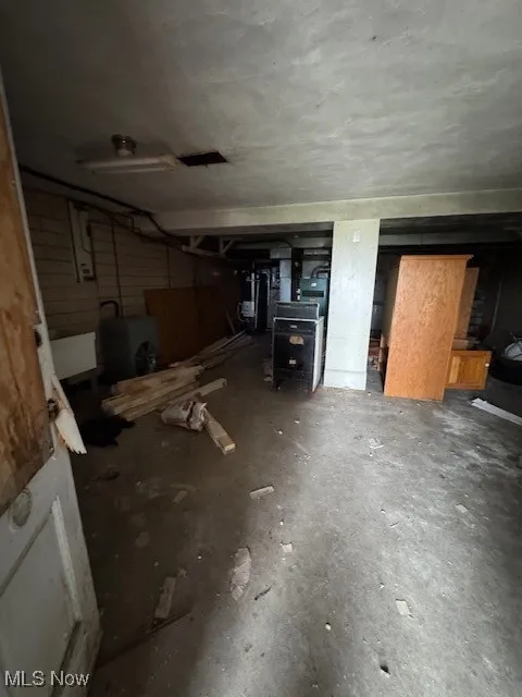 Garage featuring water heater