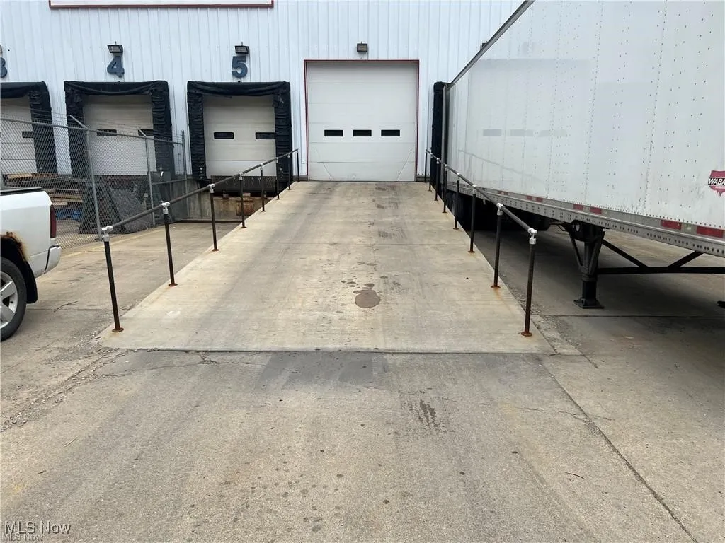 Garage featuring driveway