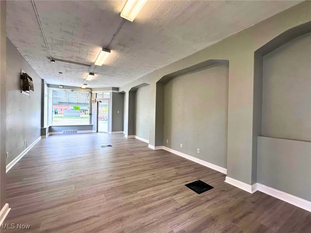 The view from the back of space towards storefront window