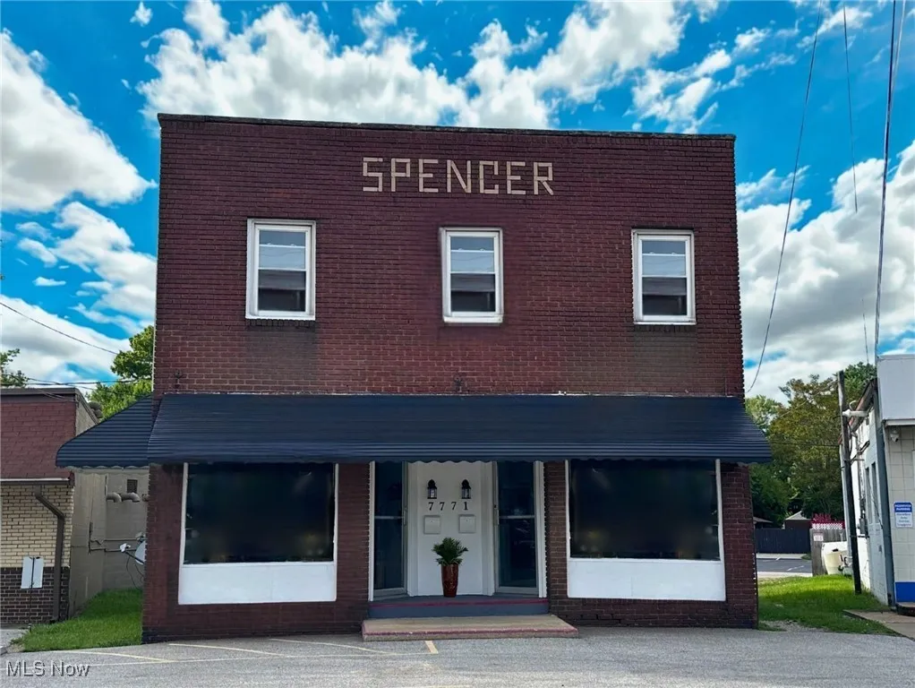 View of front facade, storefronts