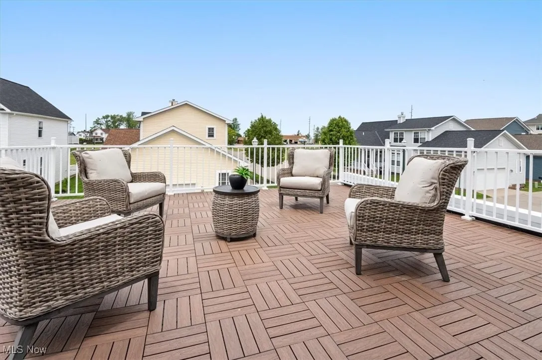 View of patio / terrace featuring outdoor lounge area, a balcony, and a residential view