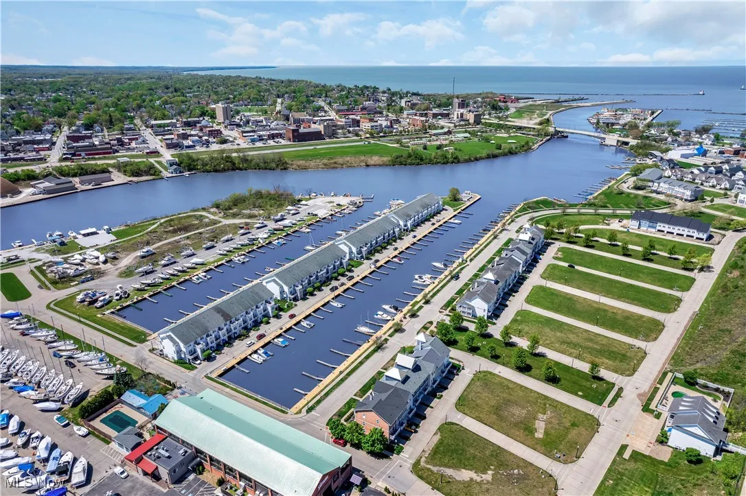 Aerial view of a large body of water and a marina