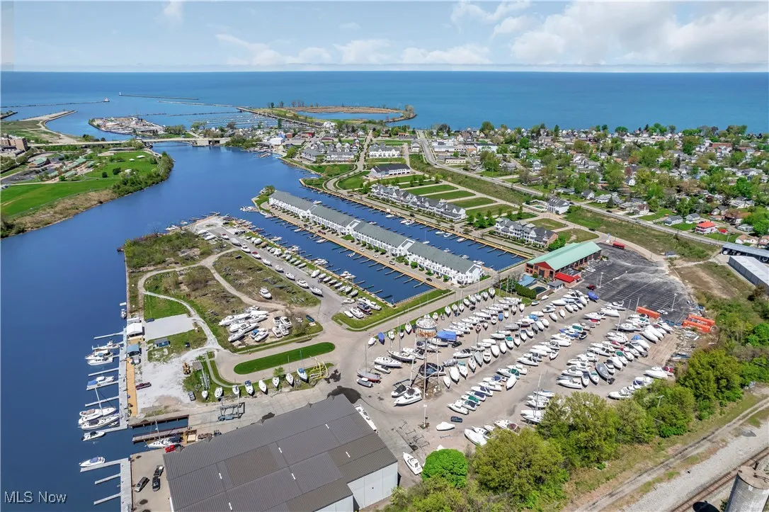 Aerial view of a nearby body of water and a marina