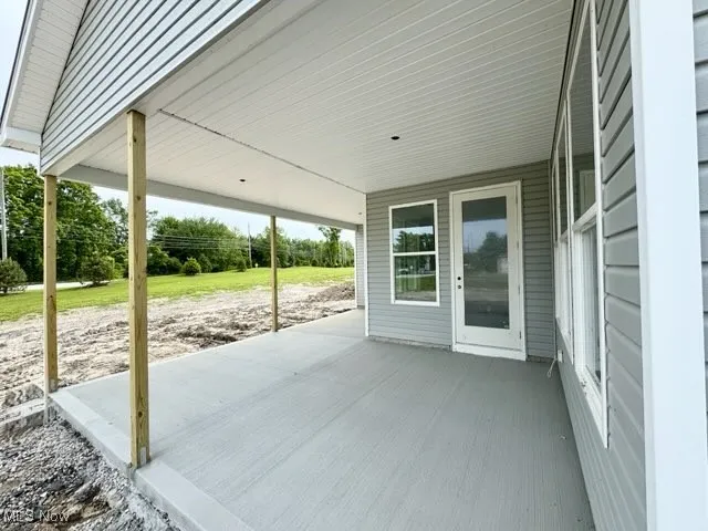 Rear covered patio with a private back yard
