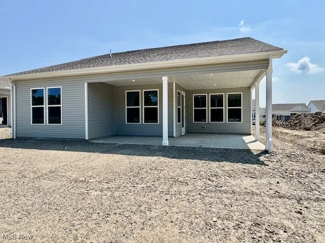 Back of property with a patio area