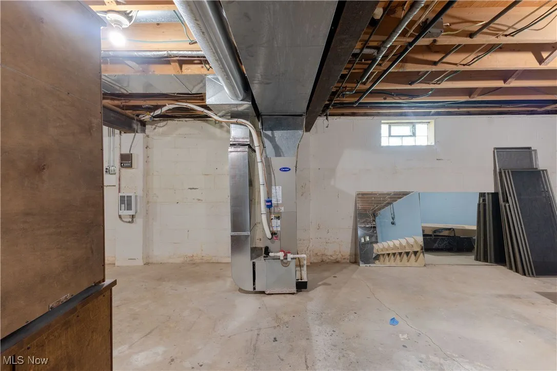Below grade area with heating unit