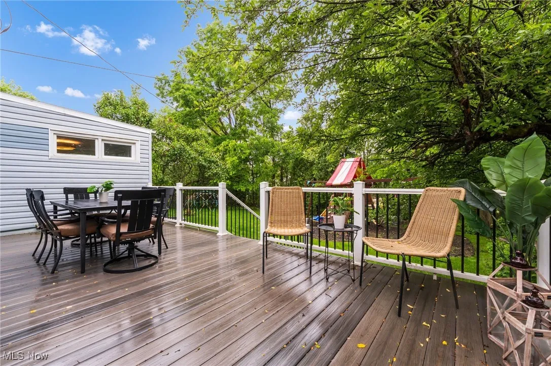 Wooden deck with outdoor dining area