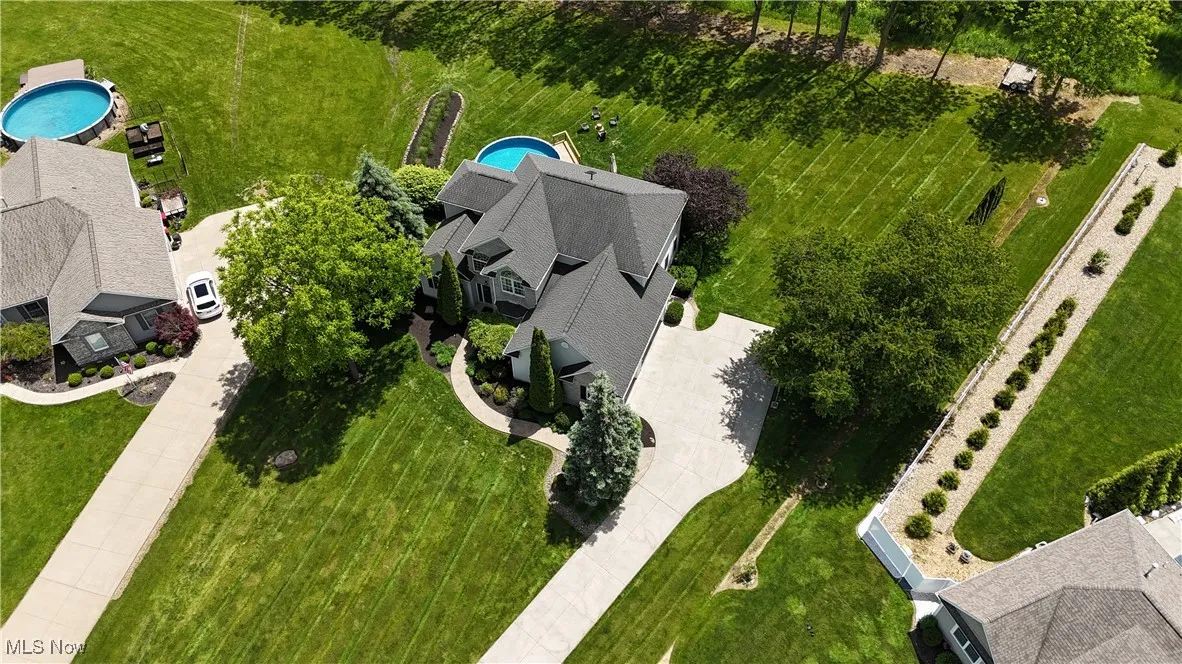 Drone / aerial view of a pool area