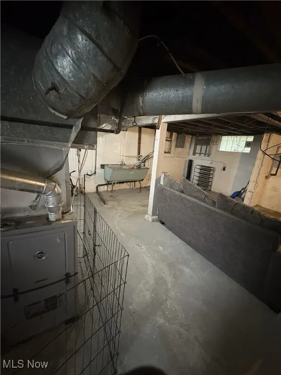 Basement featuring a sink