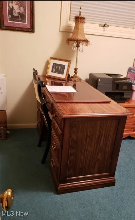 Office featuring carpet and baseboards