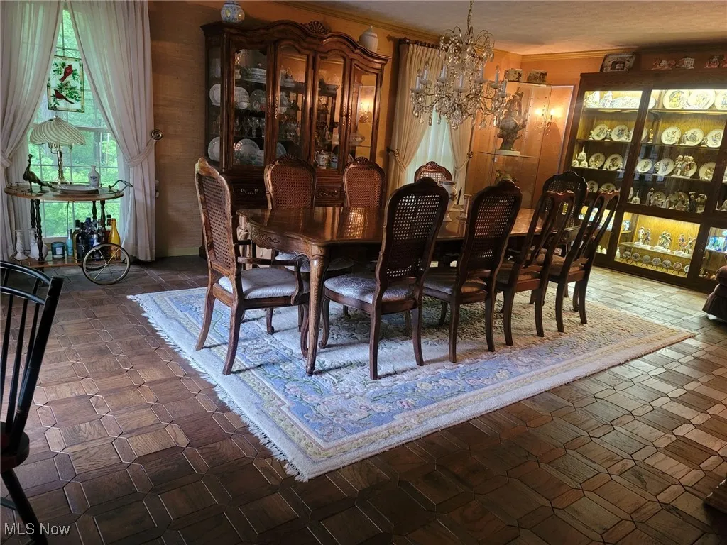 Dining space with a chandelier
