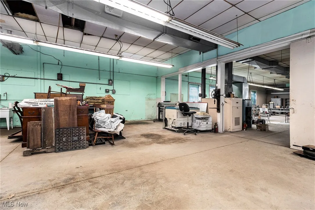 Garage featuring a workshop area