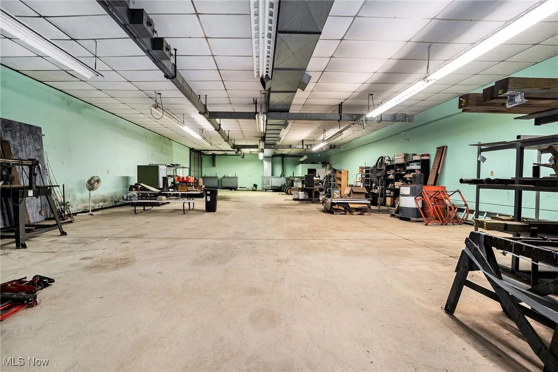 Miscellaneous room featuring concrete floors