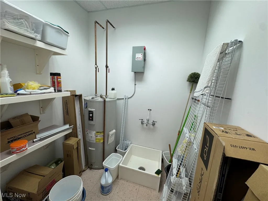Utility room with electric water heater