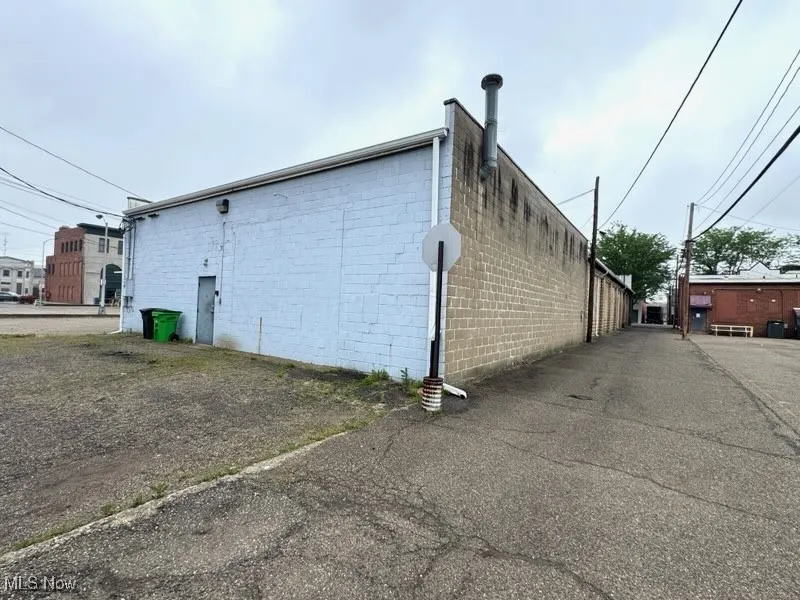 View of side of property with parking in rear