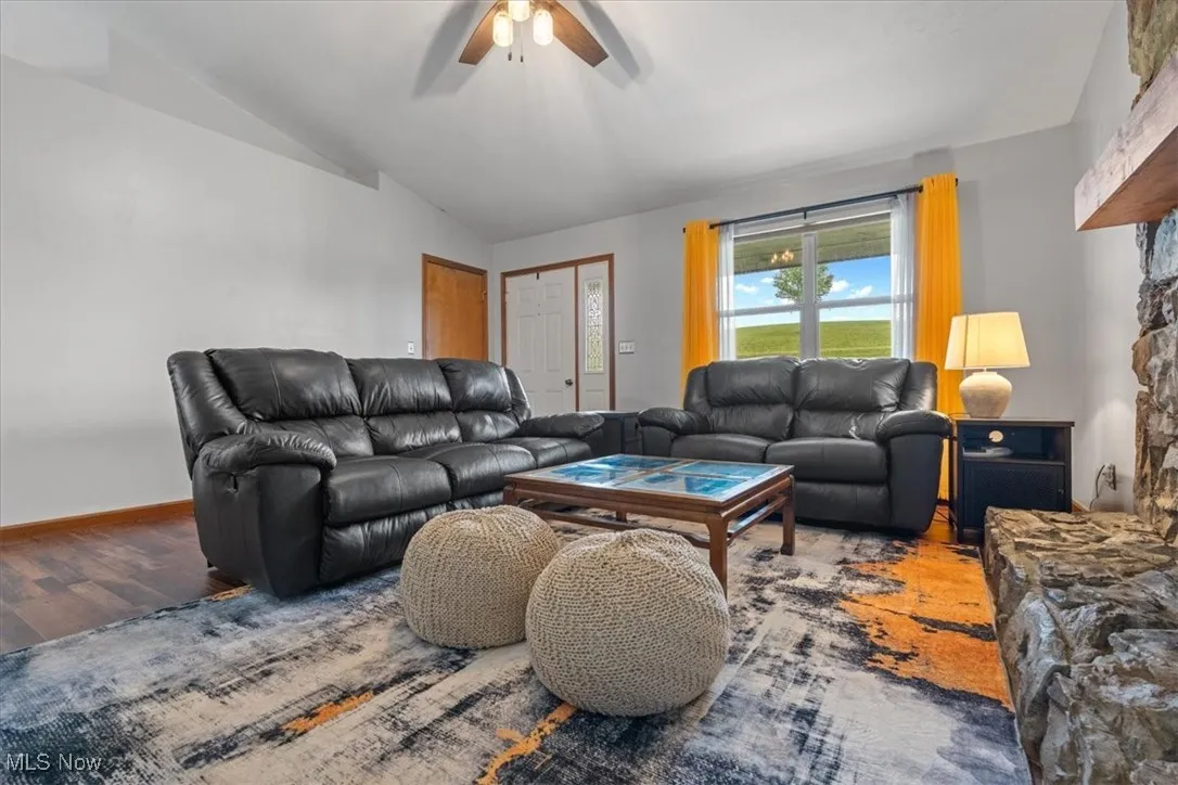 Front entry brings you into a living room with fireplace.