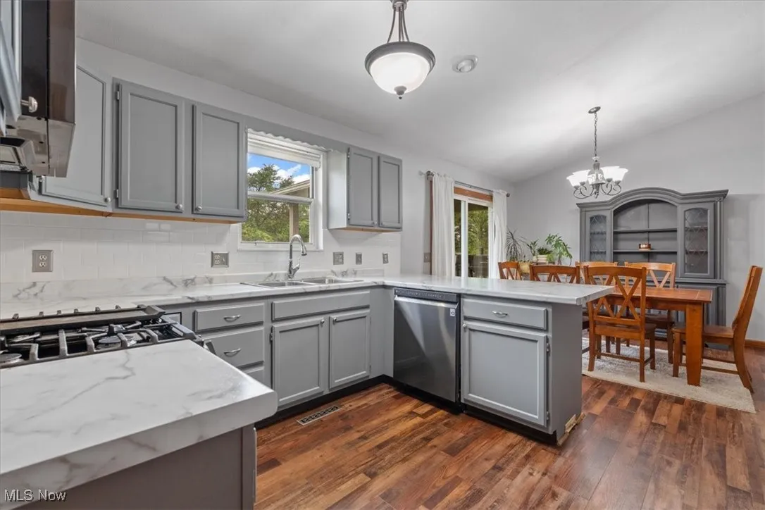 Room for the home chef to prepare a meal and still enjoy those gathered at the table.