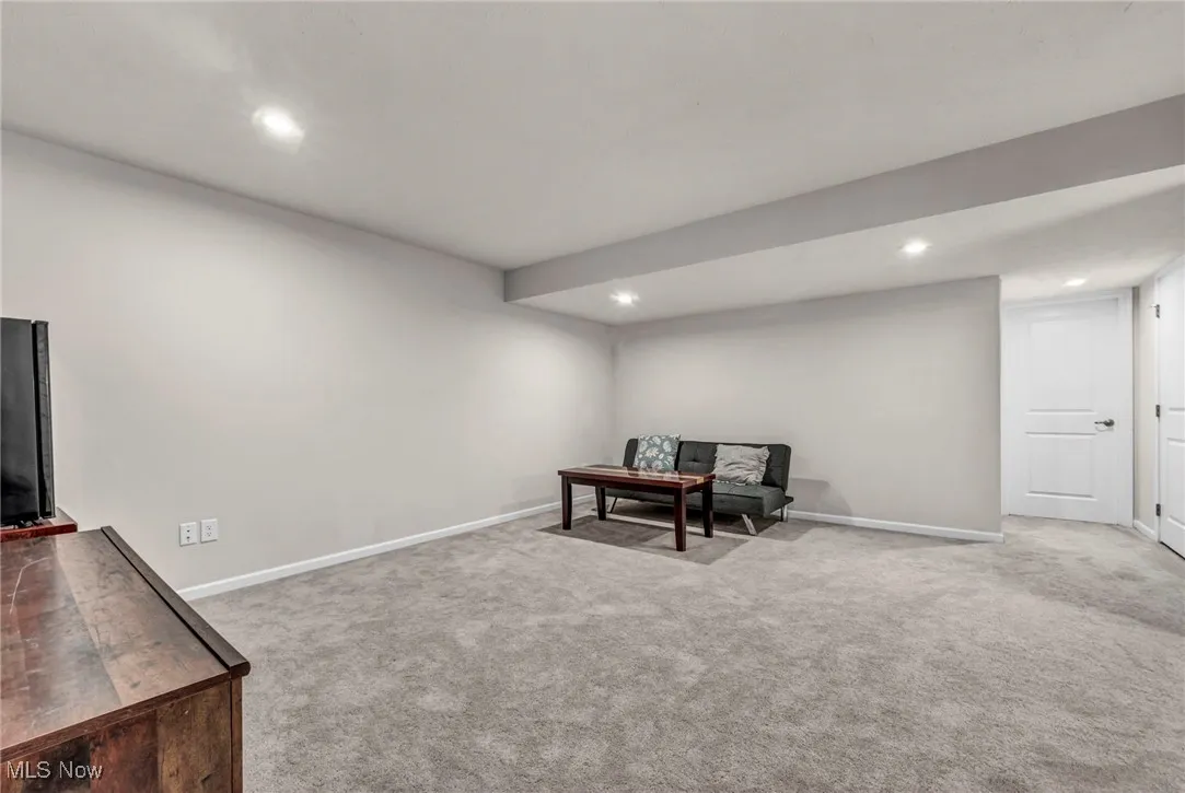 Office with carpet floors, baseboards, and recessed lighting