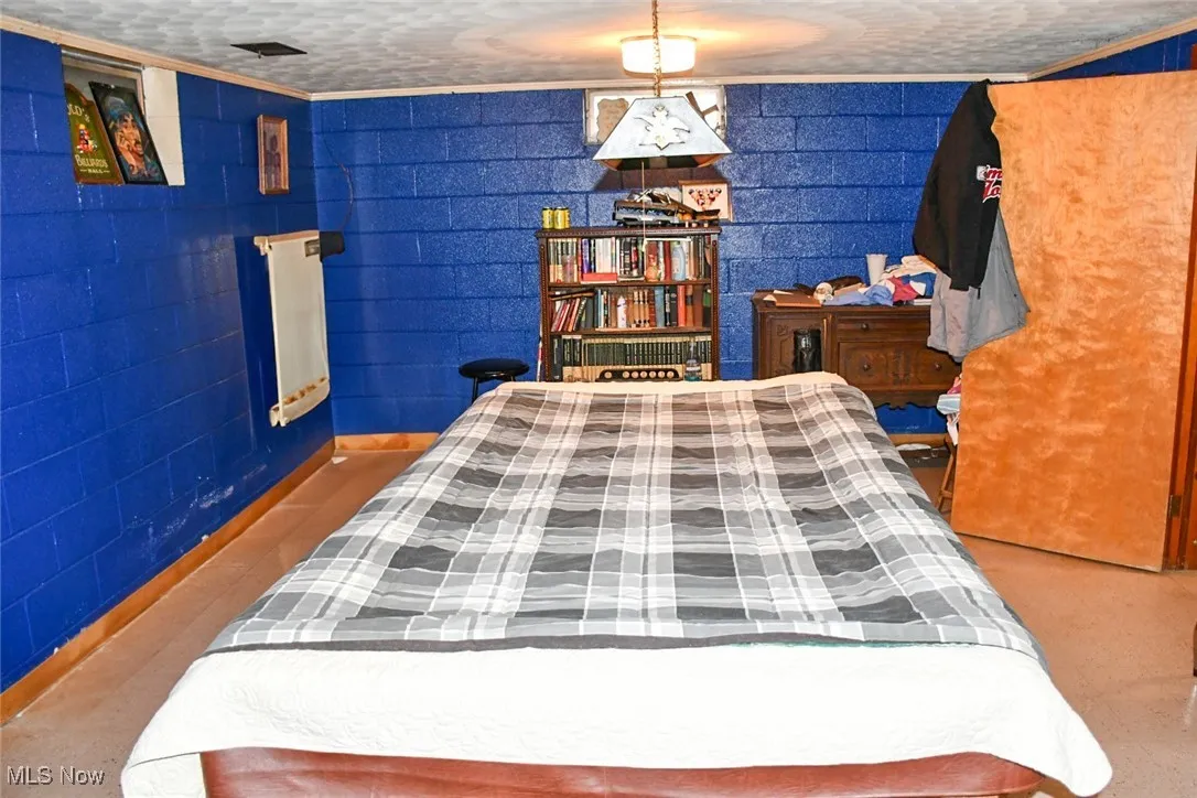 Bedroom with ornamental molding