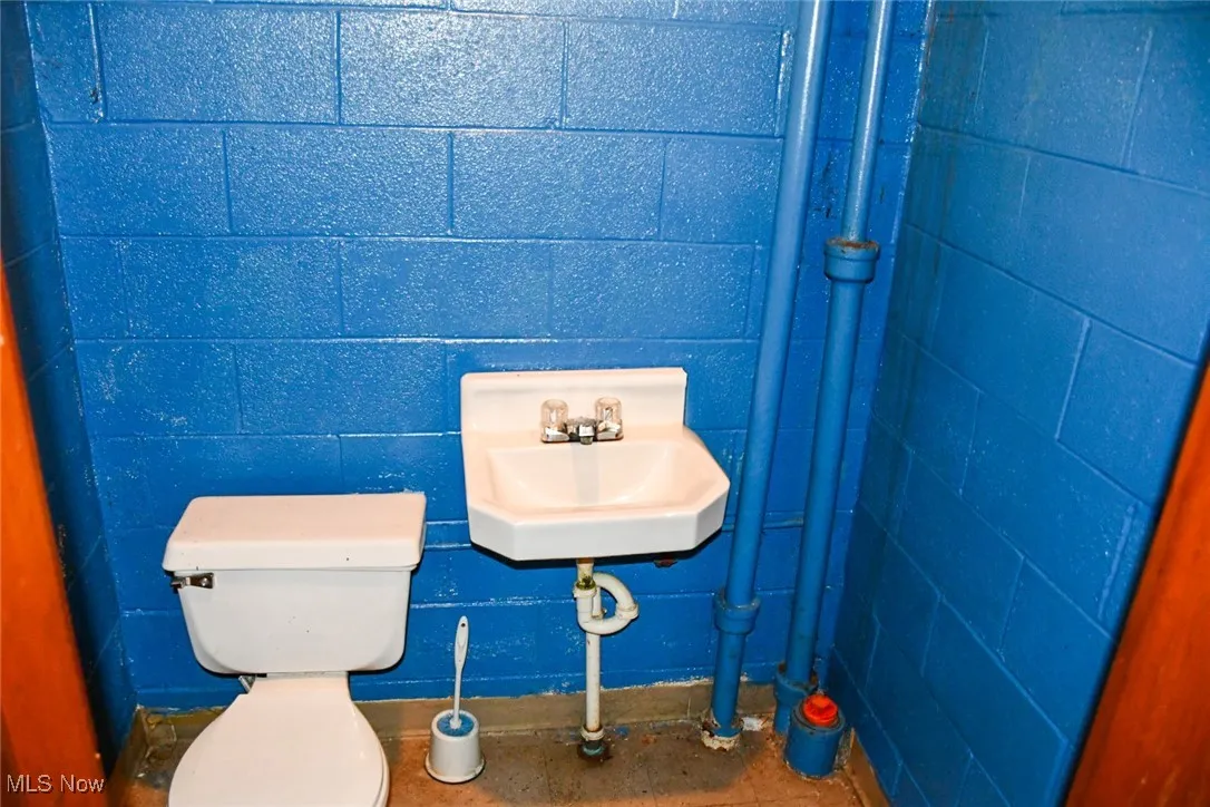 Bathroom featuring toilet and a sink