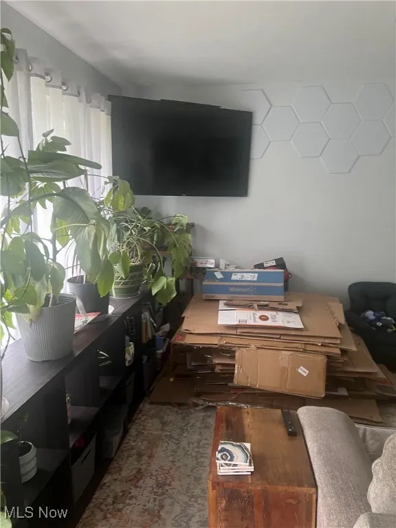 Living area featuring wood finished floors