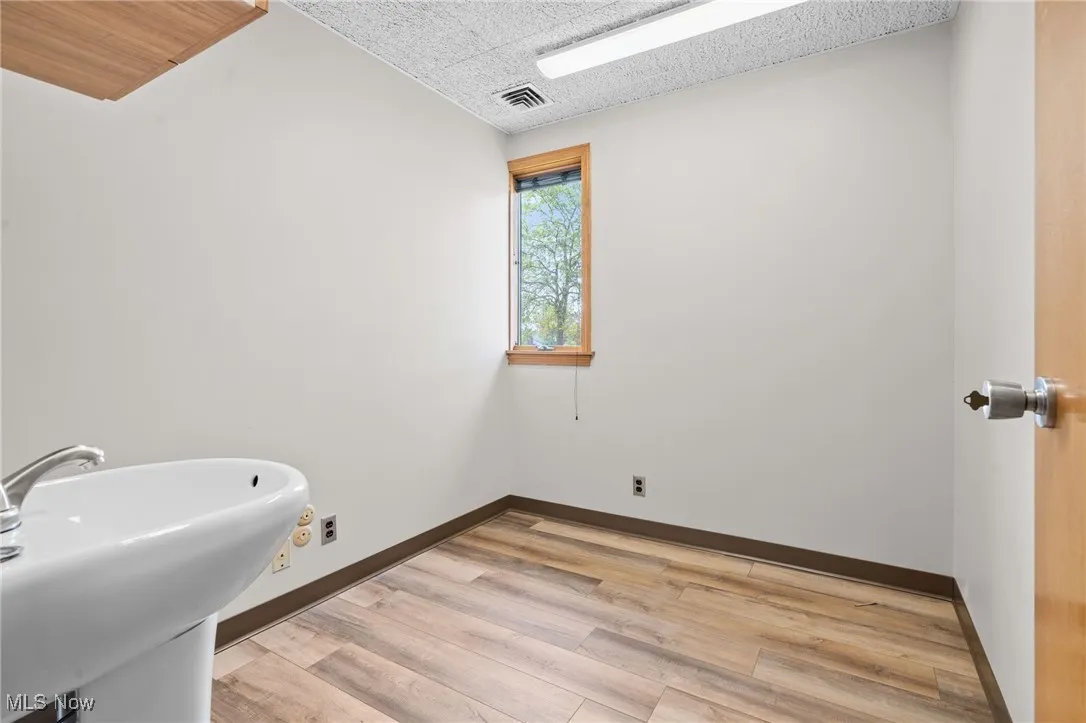 Exam room 4 with sink and LVT flooring