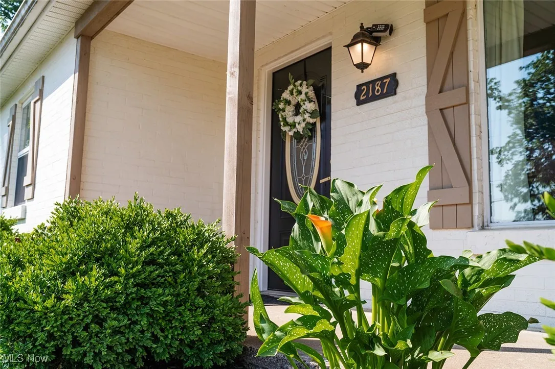 Property entrance featuring a porch
