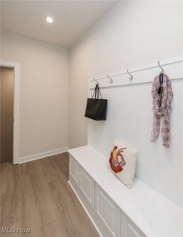Mudroom with built in bench and closet

