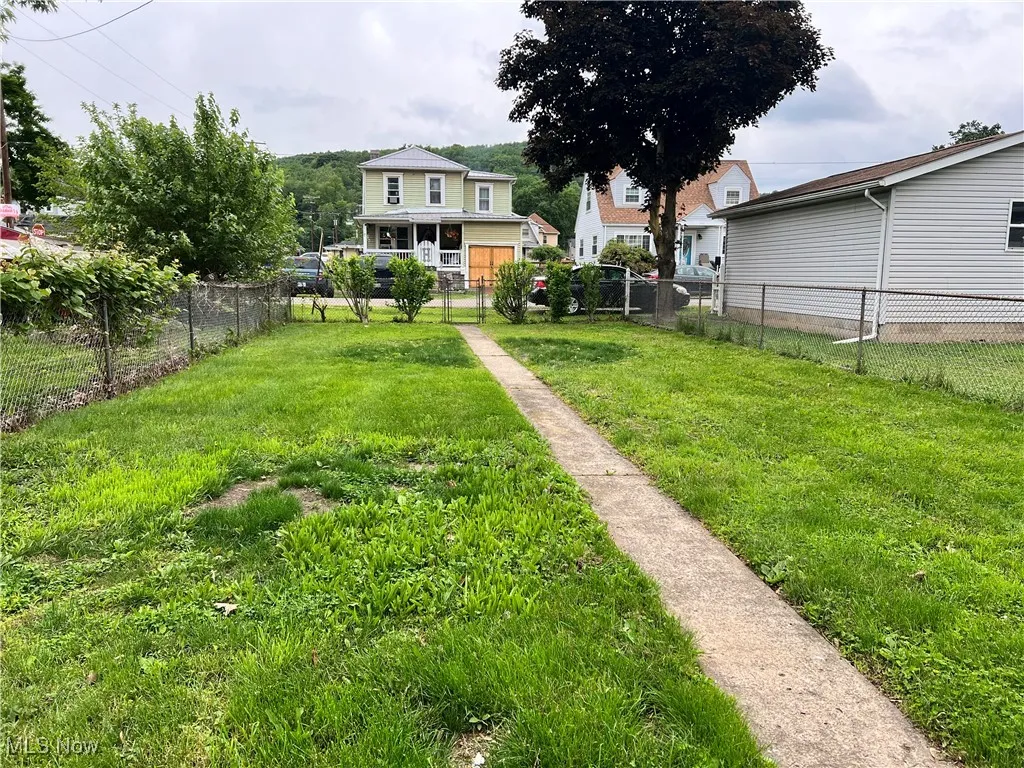 View of fenced in back yard.