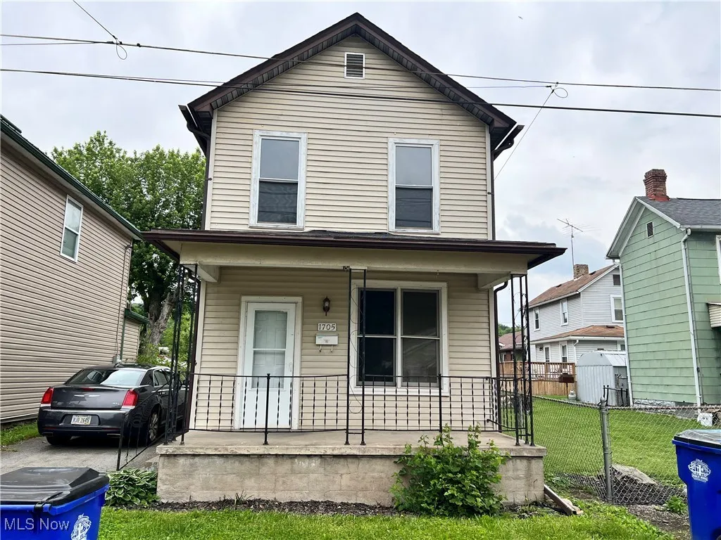 View of front of house with covered porch