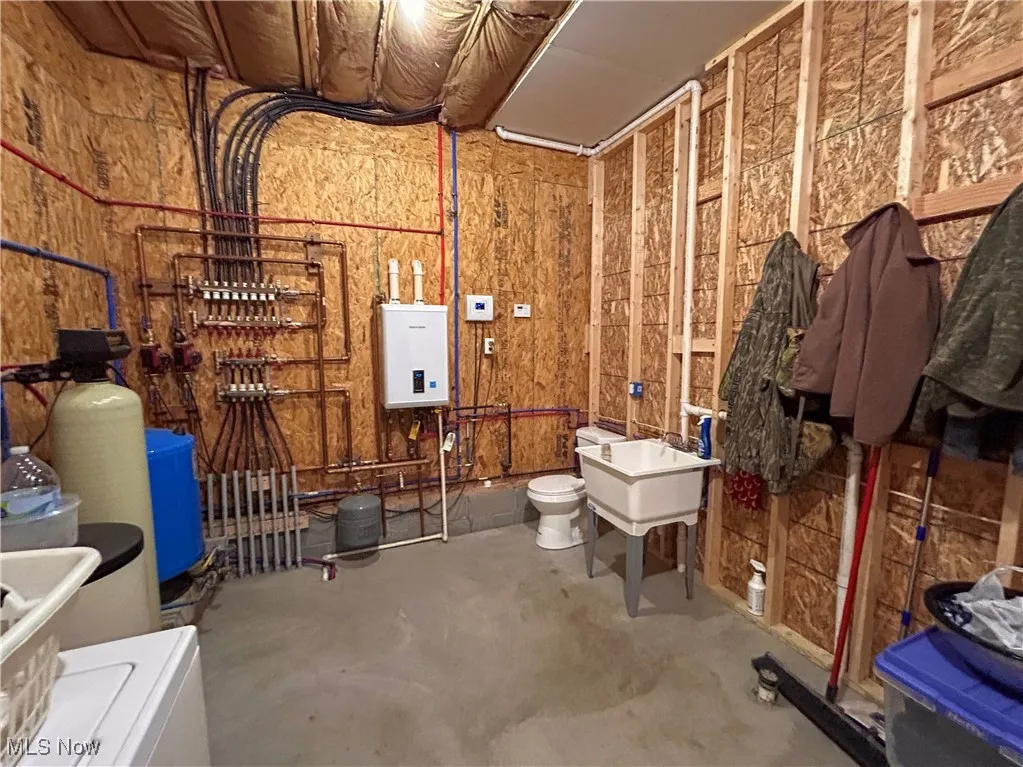 Laundry with half bath and radiant heat system
