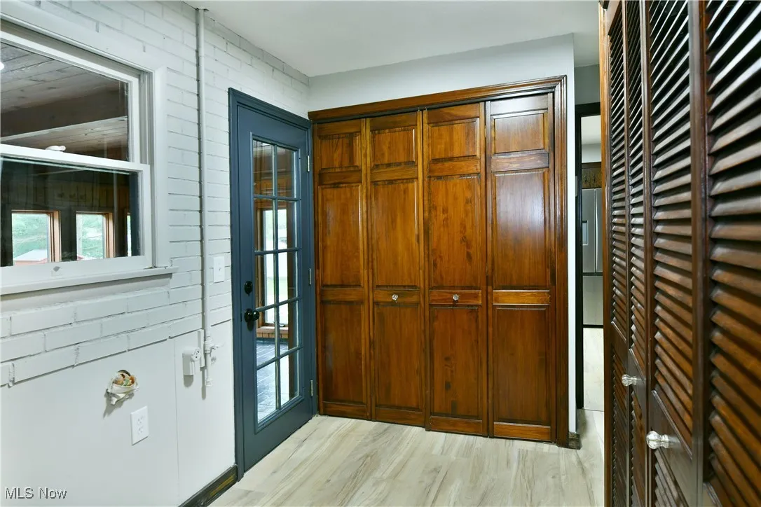 Entrance foyer featuring light wood finished floors