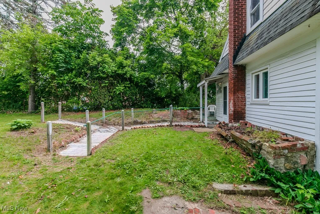 View of yard with a garden