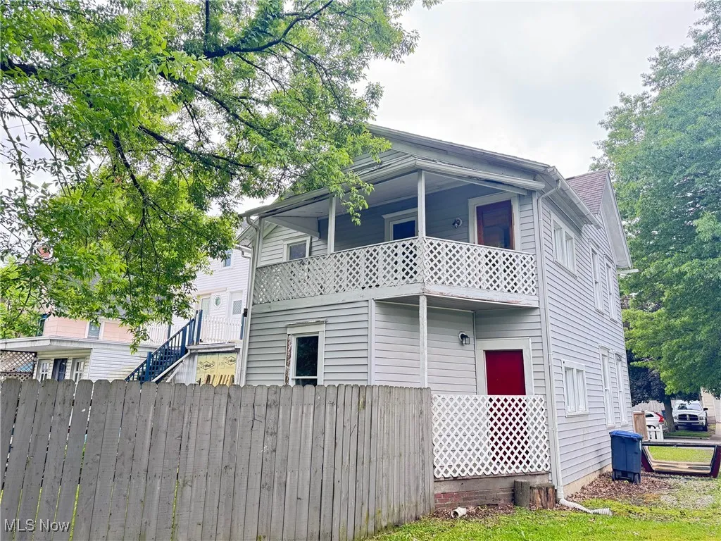 View of property exterior with a balcony