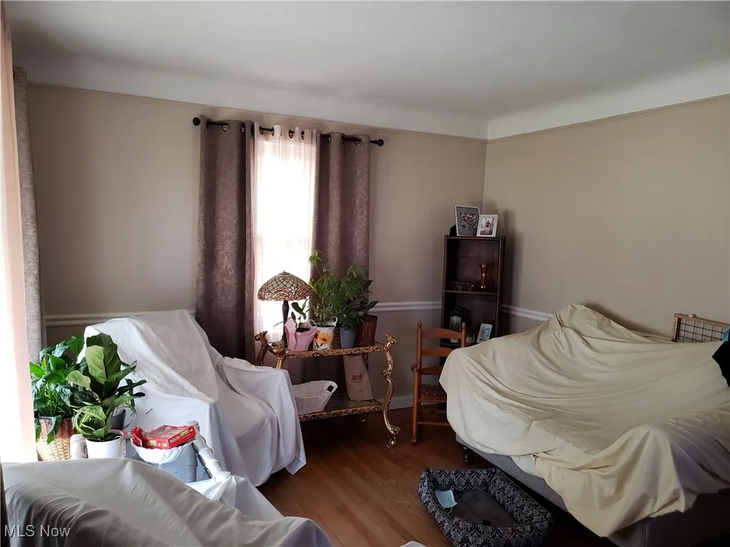 Bedroom featuring wood finished floors