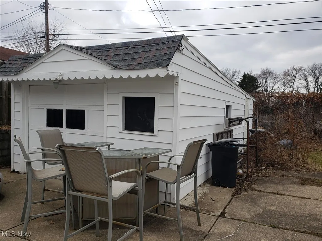 View of patio / terrace featuring an outbuilding and outdoor dining area