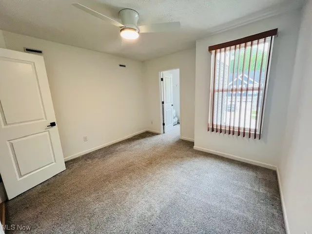 Third Second floor bedroom has a ceiling fan...