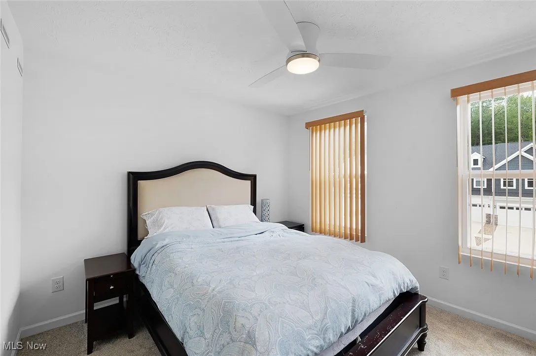 Second bedroom also has a walk in closet and ceiling fan.