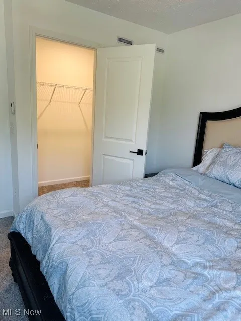 Spacious walk in closet.