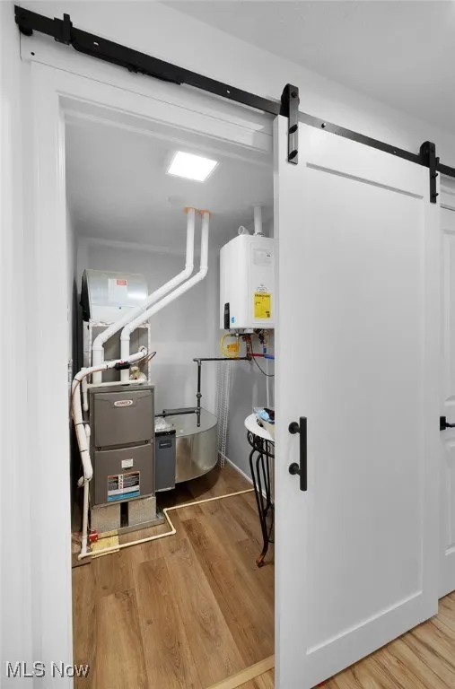 Second floor has charming barn doors!