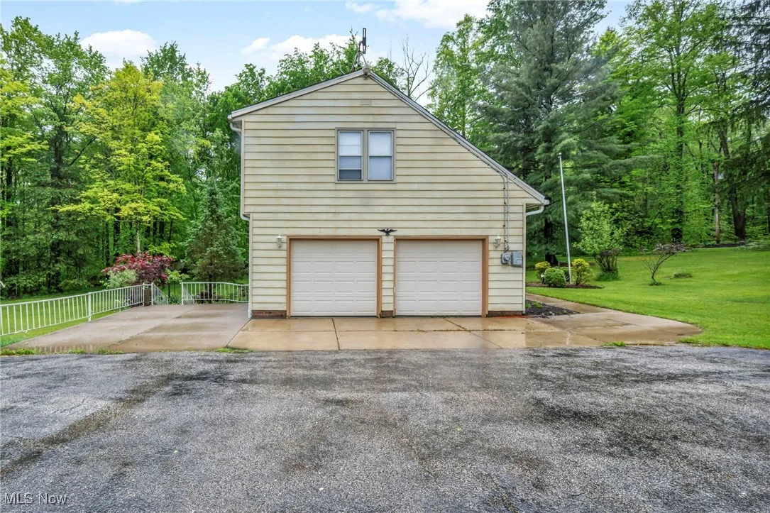 View of home's exterior with a garage