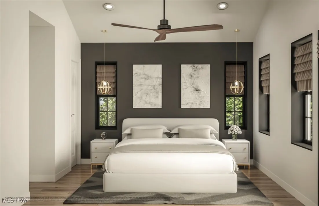 Bedroom featuring baseboards, wood finished floors, and recessed lighting