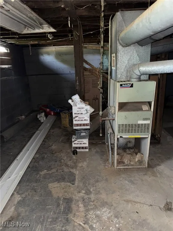 Unfinished basement with heating unit