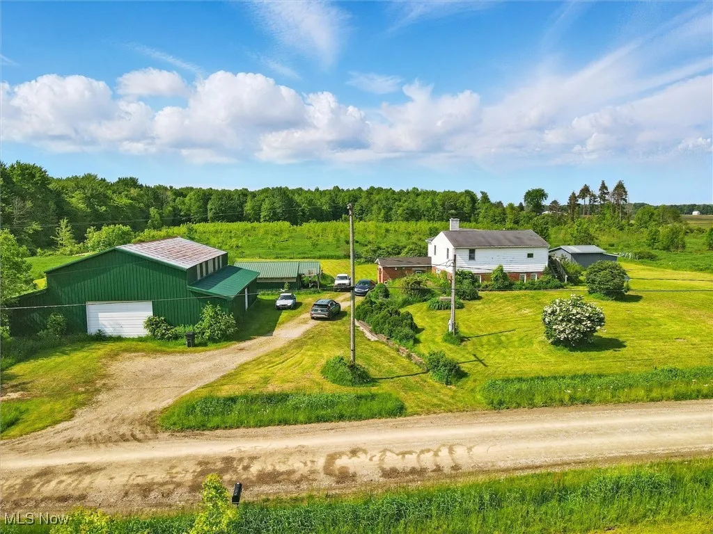 View from above of property featuring a forest