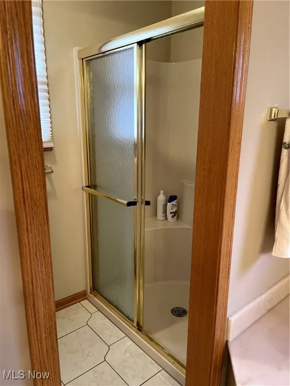Full bath with a stall shower