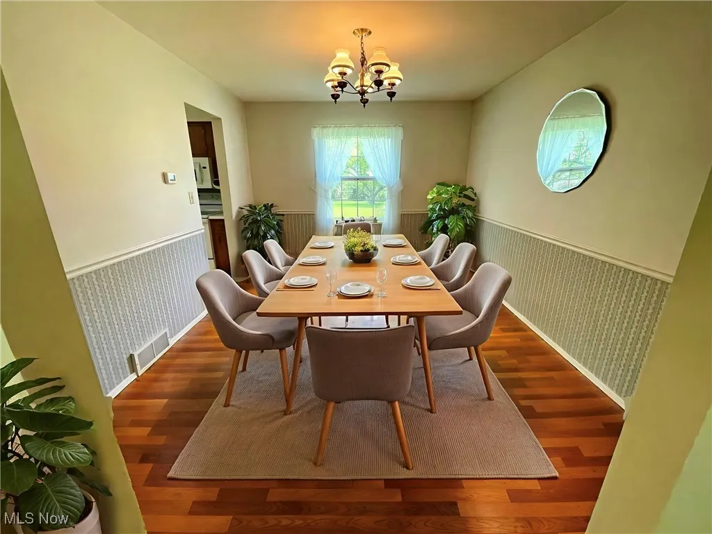 Dining room from living room entrance - virtually staged