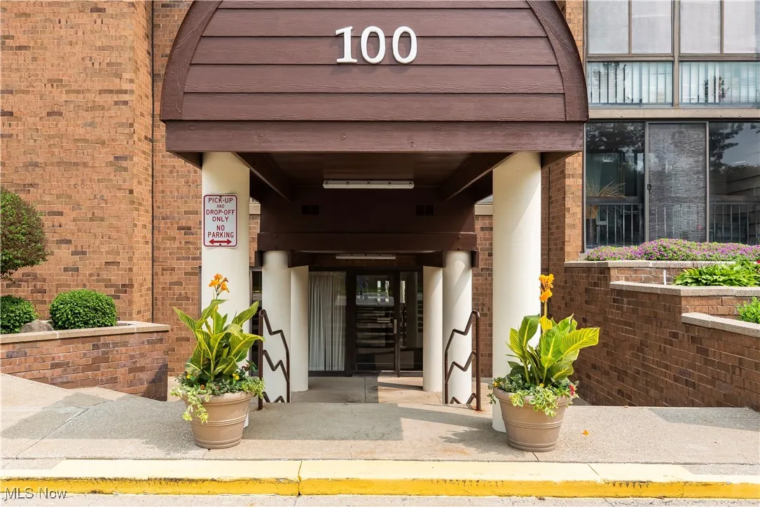 Property entrance with brick siding
