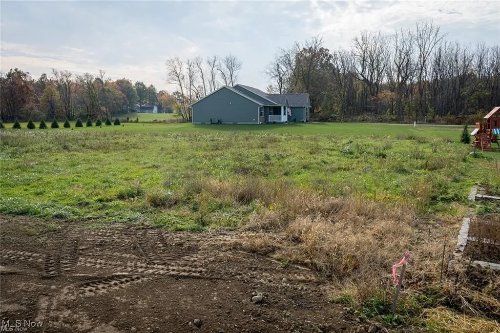 View of yard featuring a view of rural / pastoral area