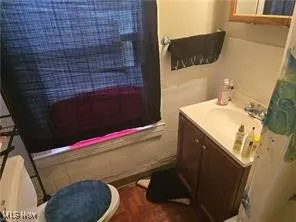 Bathroom with vanity and toilet