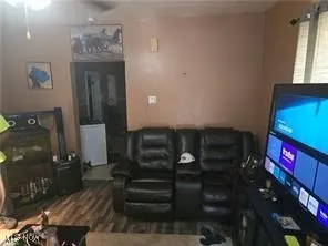 Living room with wood finished floors